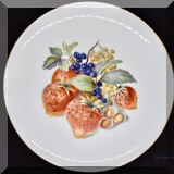 P32. Set of 8 Winterling fruit design luncheon plates. One plate chipped. 7.5”w - $24 